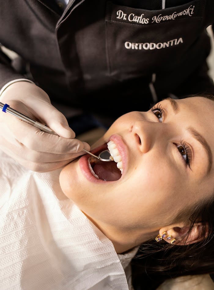 Patient Receiving Dental Checkup